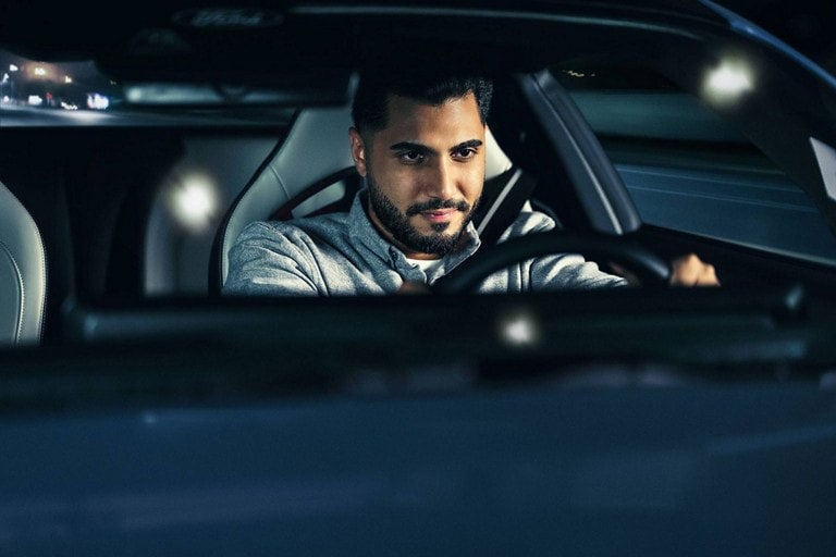 Person sitting in the driver’s seat of a parked 2024 Ford Mustang® coupe | Harlan Ford, Inc. in Okmulgee OK